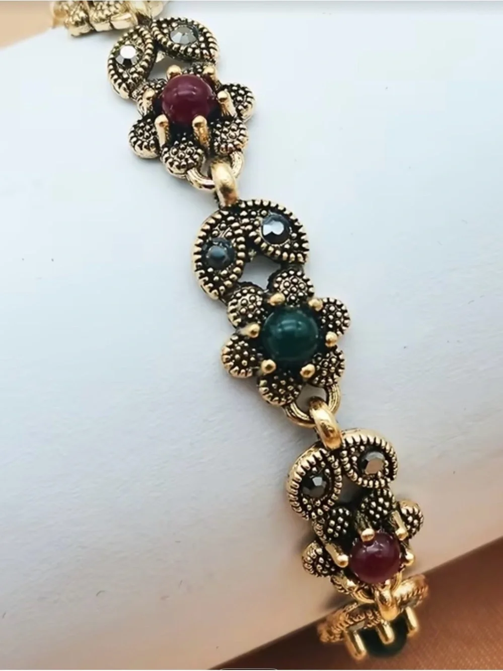 Vintage-Style Rose Gold Bracelet with Red and Green Beads